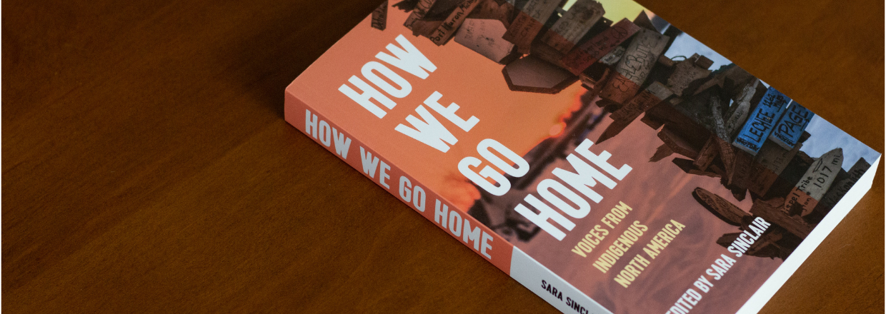 A copy of the How We Go Home book